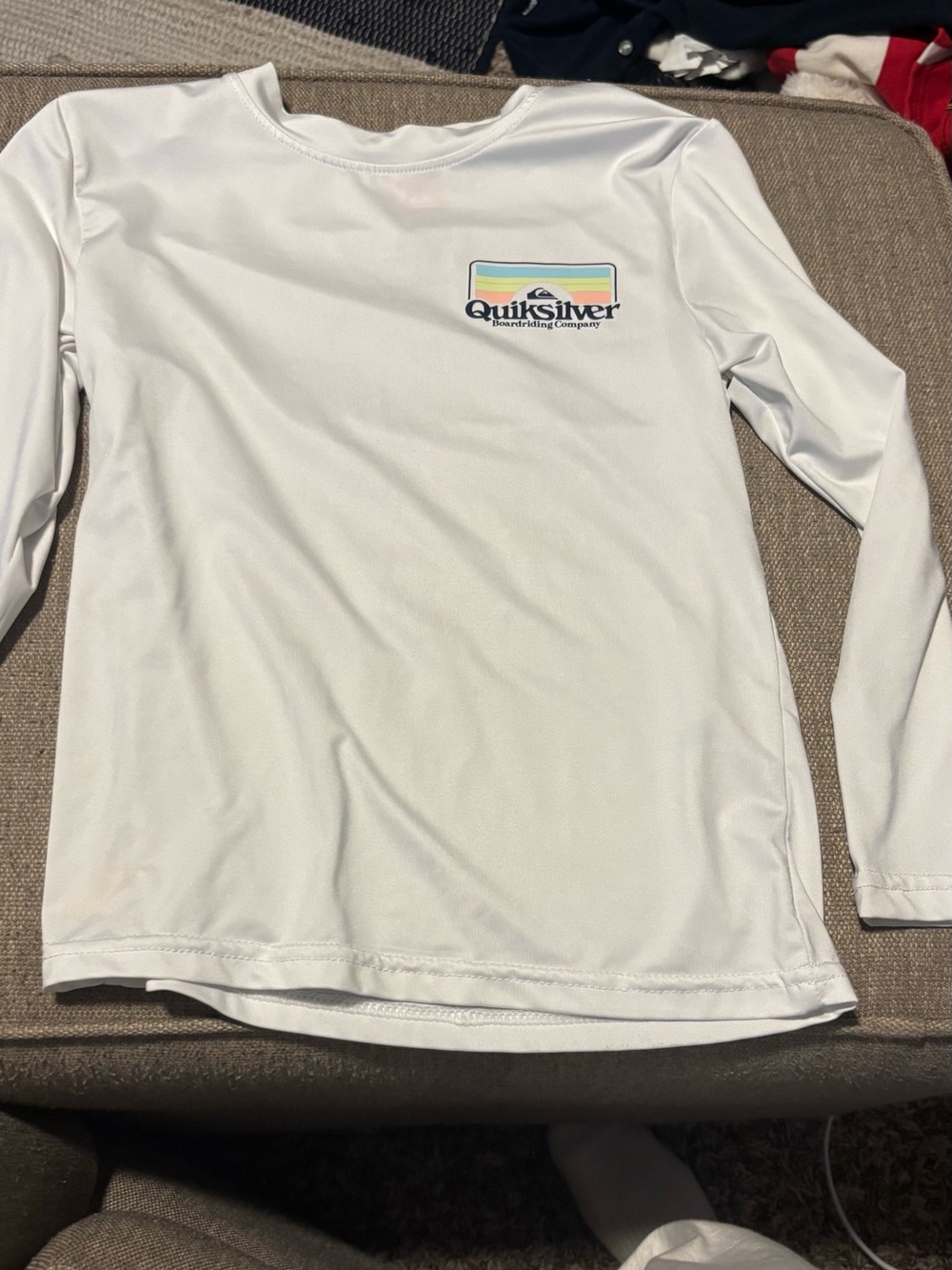 Quiksilver White Long Sleeve Rashguard with Red Logo Patch